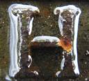 Letter H (wet rusty metal)