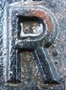 Letter R (rusty wet metal)